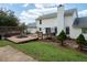 Multi-tiered deck and patio with landscaping, providing multiple spaces to relax outside the home at 3787 Pleasant Hill Church, Siler City, NC 27344