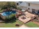 Aerial view of backyard, with deck, pool, outdoor seating and fire pit area at 3787 Pleasant Hill Church, Siler City, NC 27344