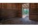 Exposed barn stall interior with natural wood finishes and ample space at 3787 Pleasant Hill Church, Siler City, NC 27344
