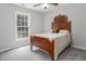Bedroom featuring a cozy bed beneath a ceiling fan and a large window at 3787 Pleasant Hill Church, Siler City, NC 27344
