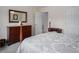 Bright bedroom with dresser, mirror, and comfortable bedding at 3787 Pleasant Hill Church, Siler City, NC 27344