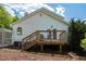 Exterior of the home with a deck, stairs, a small garden, and an air conditioning unit at 3787 Pleasant Hill Church, Siler City, NC 27344
