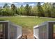 Expansive front yard view with well-maintained lawn and mature trees at 3787 Pleasant Hill Church, Siler City, NC 27344