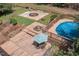 Aerial view of a pool, patio, seating and outdoor fire pit area at 3787 Pleasant Hill Church, Siler City, NC 27344