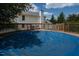Fenced in pool with surrounding deck offering privacy and seclusion and views of the lush backyard at 3787 Pleasant Hill Church, Siler City, NC 27344