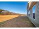 A spacious backyard with a view of the woods behind the property, perfect for outdoor activities at 40 Rosewood Ln, Youngsville, NC 27596