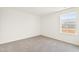 Bright bedroom with carpet, natural light, and views of the outdoors at 40 Rosewood Ln, Youngsville, NC 27596