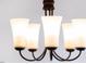 Close-up of dining room chandelier at 40 Rosewood Ln, Youngsville, NC 27596