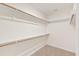 Walk-in closet with shelves and rods for ample storage space at 40 Rosewood Ln, Youngsville, NC 27596
