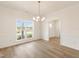 Dining room with large window offering ample natural light at 40 Rosewood Ln, Youngsville, NC 27596