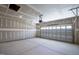 An empty two car garage with an automatic door opener at 40 Rosewood Ln, Youngsville, NC 27596