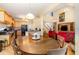 Open concept dining room featuring eat-in kitchen, table, and seating for six at 401 Stinhurst Dr, Durham, NC 27713