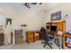 Home office area with a desk, shelves, and a view of the staircase at 401 Stinhurst Dr, Durham, NC 27713