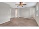 Neutral bedroom featuring plush carpet, a ceiling fan and a bright and airy feel at 41 Willow Green Dr, Clayton, NC 27527