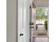 View of the open front door that leads to a walkway with greenery on either side at 41 Willow Green Dr, Clayton, NC 27527