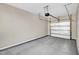 Clean garage space featuring sealed concrete floors at 41 Willow Green Dr, Clayton, NC 27527