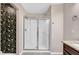 Updated shower with glass doors and updated fixtures for a clean and contemporary look at 41 Willow Green Dr, Clayton, NC 27527