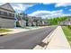 Street view of townhomes highlighting proximity to street and curb appeal at 41 Willow Green Dr, Clayton, NC 27527