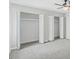 Bedroom with carpet and closet space at 4101 Five Oaks Dr # 40, Durham, NC 27707