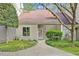 Charming townhome with a well-manicured lawn and inviting walkway to the front door at 4101 Five Oaks Dr # 40, Durham, NC 27707