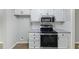 Beautiful kitchen featuring stainless steel appliances, and white cabinets at 4101 Five Oaks Dr # 40, Durham, NC 27707