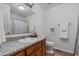 Bathroom with granite countertop vanity and updated fixtures at 413 Bayles Rd, Lillington, NC 27546