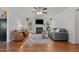 Cozy living room featuring a fireplace, comfortable seating, and ample natural light, creating a welcoming atmosphere at 413 Bayles Rd, Lillington, NC 27546