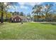 Lovely single-Gathering home with a brick facade, well-maintained lawn, and a two-car attached garage at 460 Mann Rd, Coats, NC 27521