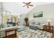 Inviting living room featuring neutral tones, hardwood floors, and plenty of natural light at 460 Mann Rd, Coats, NC 27521