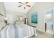 Bright bedroom with a comfortable king-size bed and ensuite bathroom at 460 Mann Rd, Coats, NC 27521