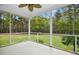 Screened porch with view of large backyard at 460 Mann Rd, Coats, NC 27521