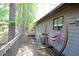 Outdoor deck showcasing a relaxing hammock with a view of trees at 502 W Poplar Ave # C2, Carrboro, NC 27510