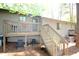 Backyard with a wooden deck featuring outdoor seating and a hammock at 502 W Poplar Ave # C2, Carrboro, NC 27510