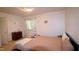 Bedroom featuring carpet floors, a window, and neutral walls at 502 W Poplar Ave # C2, Carrboro, NC 27510