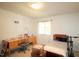 Bedroom featuring desk, bed, and natural light at 502 W Poplar Ave # C2, Carrboro, NC 27510