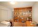 Cozy bedroom featuring a large wooden bookshelf and a comfortable twin bed at 502 W Poplar Ave # C2, Carrboro, NC 27510