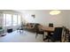 Cozy living room and dining area with neutral tones and natural lighting at 502 W Poplar Ave # C2, Carrboro, NC 27510