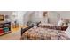 Playful bedroom with two twin beds, a daybed, and built-in shelving at 5212 Theys Rd, Raleigh, NC 27606