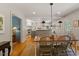 Charming dining room open to the kitchen, perfect for entertaining guests at 5212 Theys Rd, Raleigh, NC 27606