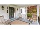 Cozy front porch with rocking chairs, perfect for enjoying the outdoors at 5212 Theys Rd, Raleigh, NC 27606
