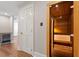 Home interior featuring a luxury sauna and a built-in beverage cooler near the entrance at 5212 Theys Rd, Raleigh, NC 27606