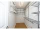 Walk-in closet with metal shelving for optimal storage and organization at 5403 Bayside Ct, Raleigh, NC 27613