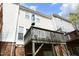 Exterior shot of deck with umbrella, overlooking property at 5403 Bayside Ct, Raleigh, NC 27613