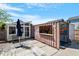 Outdoor patio area featuring container bar, seating, and landscaping at 545 E Lenoir St, Raleigh, NC 27601
