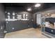 Unfinished basement area featuring painted walls and concrete floors at 545 E Lenoir St, Raleigh, NC 27601