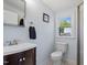 Bright bathroom featuring a modern vanity and a walk-in shower at 545 E Lenoir St, Raleigh, NC 27601
