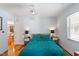 Cozy bedroom featuring hardwood floors and comfortable decor at 545 E Lenoir St, Raleigh, NC 27601