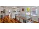 Open dining area with modern table and chairs, adjacent to the kitchen at 545 E Lenoir St, Raleigh, NC 27601