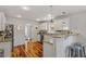 Bright kitchen featuring white cabinets, stainless steel appliances and breakfast bar at 545 E Lenoir St, Raleigh, NC 27601
