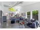 Bright and airy living room features high ceilings and kitchen area at 545 E Lenoir St, Raleigh, NC 27601